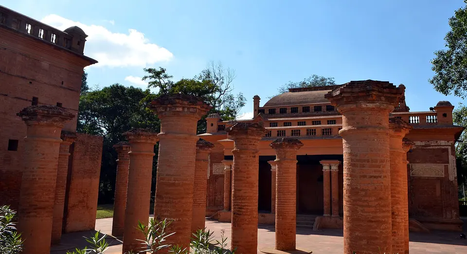 Red-brick columns and arches of the old palace ruins inside Kangla Fort, Imphal