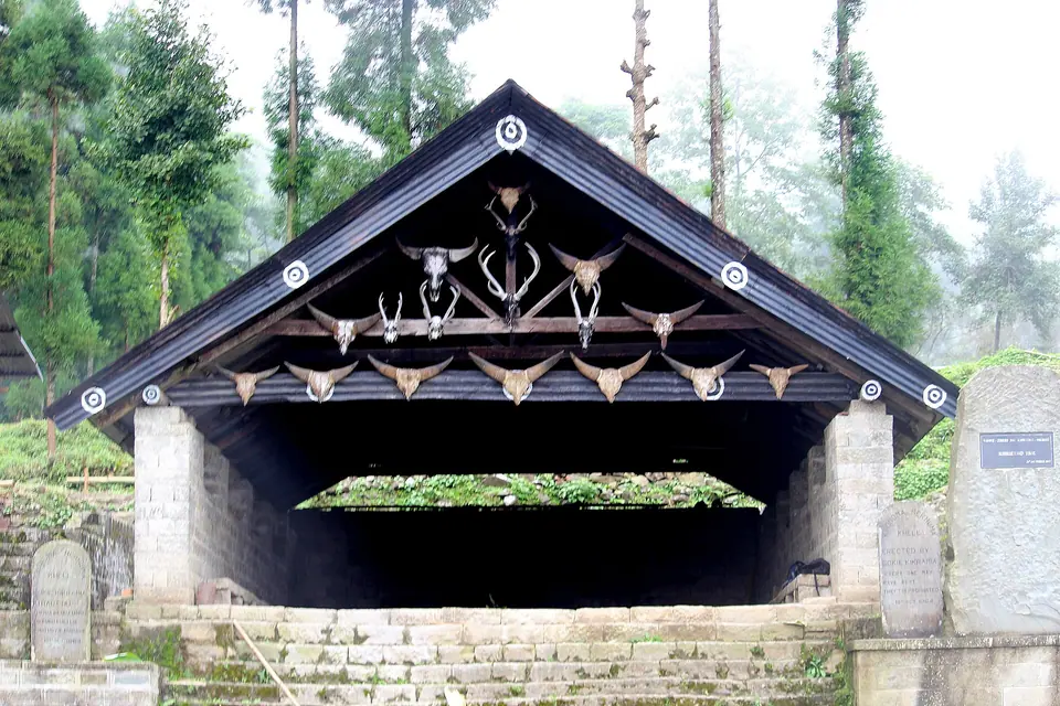 A traditional Angami gateway decorated with mithun horns and carvings at Khonoma