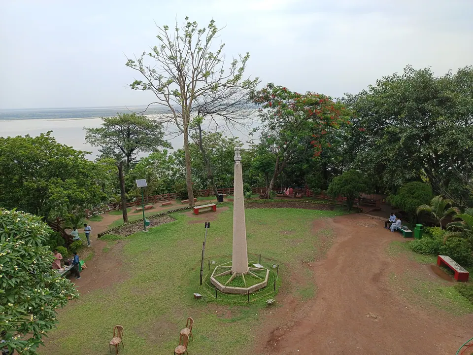 Leafy hilltop park at Agnigarh in Tezpur, with the Brahmaputra visible beyond the trees